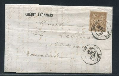 an old envelope with a stamp on it sitting on a table