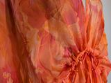 an orange and pink dress on a mannequin mannequin mannequin mannequin mannequin mannequin mannequin mannequin mann