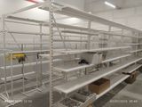 many shelves in the warehouse with boxes on them