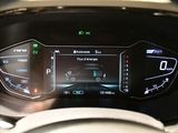 a close up of a car ' s dashboard with a digital display