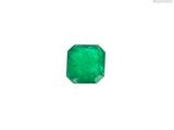 a close up of a emerald stone on a white background