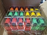 une boîte contenant un assortiment de montres de différentes couleurs