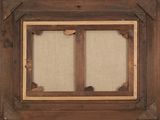 an old picture of a picture frame with a picture in it