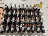 a lot of different types of valves on a pallet