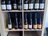 many bottles of wine on the shelves in the room