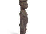an image of a statue of a man with a hat on his head