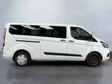 a white van that is parked in a parking lot