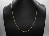 a gold chain necklace on a mannequin mannequin mannequin mannequin mannequin mannequin mannequin mannequin manne