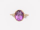 an oval amethorate and diamond ring in yellow gold