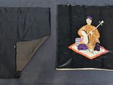 a picture of a piece of cloth with a picture of a man on it