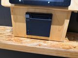 a television that is sitting on top of a wooden stand