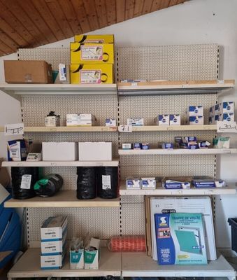a shelf with many items on it in a room