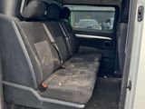 a white van with two seats in the back of it