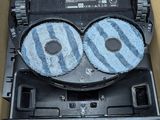 a cardboard box with a cd player inside of it