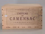 une boîte en bois sur laquelle est apposée une étiquette portant l'inscription « Château Camensac »