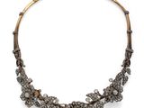 a diamond and gold necklace, by van cleef