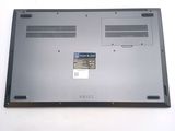 a close up of a laptop on a white surface