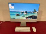 a desktop computer sitting on a desk with a keyboard and mouse