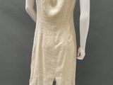 a mannequin wearing a beige dress on a mannequin mannequin mannequin mannequin mannequin mannequin mannequin mann