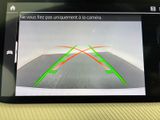 a picture of a car ' s rear view camera on a cell phone