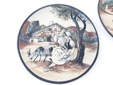 two plates with a picture of a woman and a dog