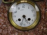 a clock that is sitting on top of a table