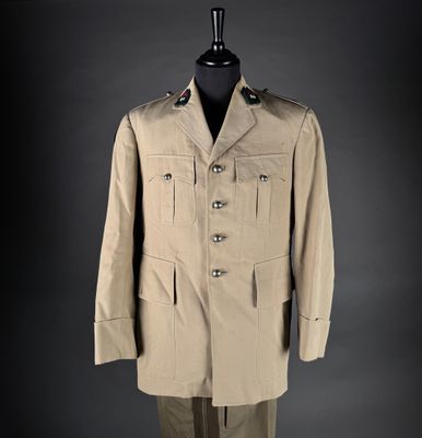 an image of a suit on a mannequin stand
