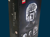 a box with a lego star wars helmet inside of it
