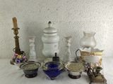 a lot of vases and other items on a table
