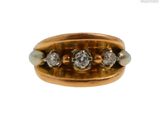 an image of a gold and diamond ring on a white background