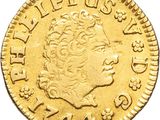 l'image d'une pièce d'or sur laquelle figure une tête de femme