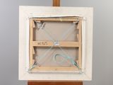 a picture of an easel with a picture on it