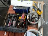 a lot of tools on a pallet in a warehouse