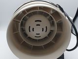 a blower that is sitting on a white surface