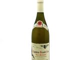 a bottle of wine that is sitting on a table