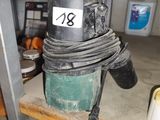 une photo d'une machine posée sur une étagère