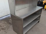 an image of a stainless steel shelf in a warehouse