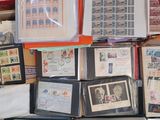 many different types of stamps on display in a box