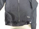 the jacket is black and has a zipper on the back