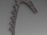 an image of a metal horse ' s head on a gray background