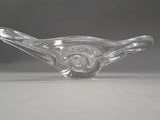 an image of a close up of a glass object on a table
