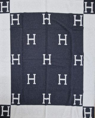 an image of a black and white scarf with white letters on it