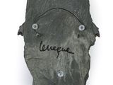 an image of a piece of rock with writing on it