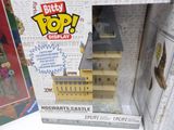 a box with a toy castle in it and a box with a toy castle in it