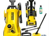 a yellow pressurer sitting next to other cleaning supplies on a white surface