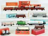 a lot of toy trains on display on a shelf