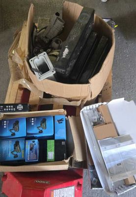 a box full of electronic equipment and a box of other items