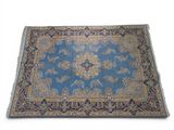 an oriental rug on a white background with a blue background