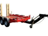 a red trailer with two wooden poles attached to it