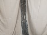 a piece of plastic wrapped in plastic sitting on top of a mattress